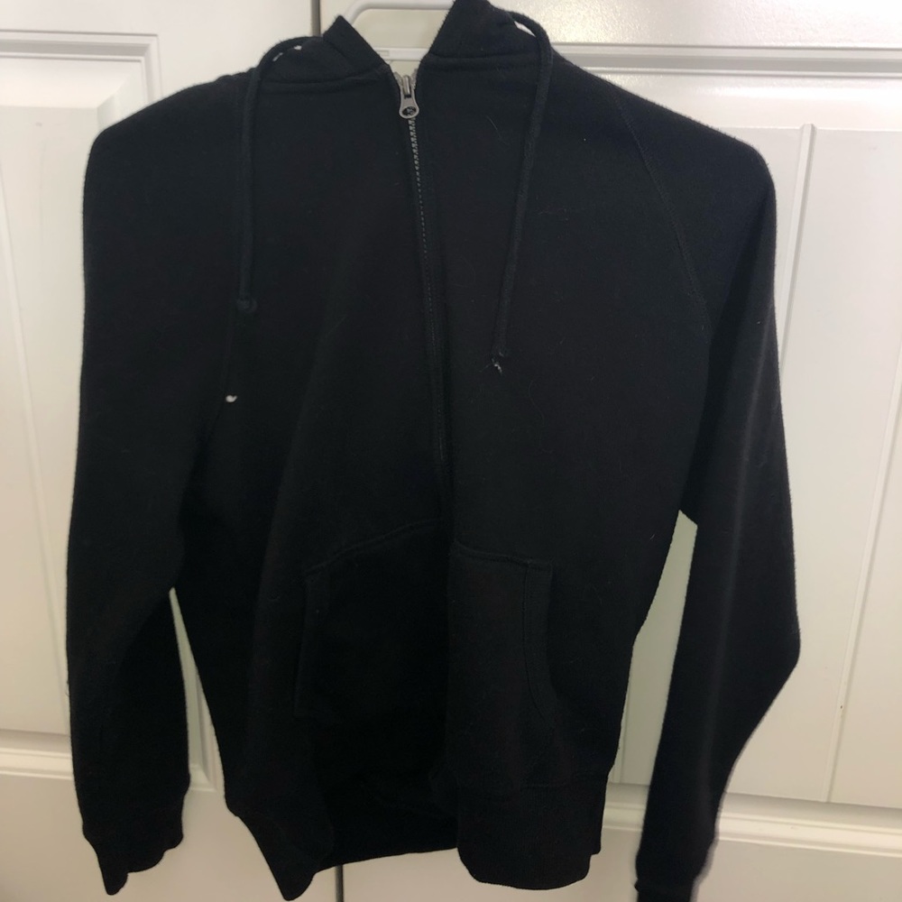 Black zip up woman’s sweater